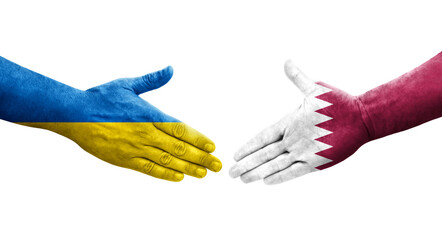 Handshake between Qatar and Ukraine flags painted on hands, isolated transparent image.