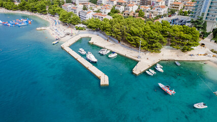 Fototapeta na wymiar Adriatic town of Makarska beaches and waterfront aerial panoramic view, Dalmatia region of Croatia