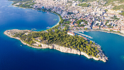 Town of Breal beach and Biokovo mountain aerial panoramic view, Makarska riviera in Dalmatia, Croatia