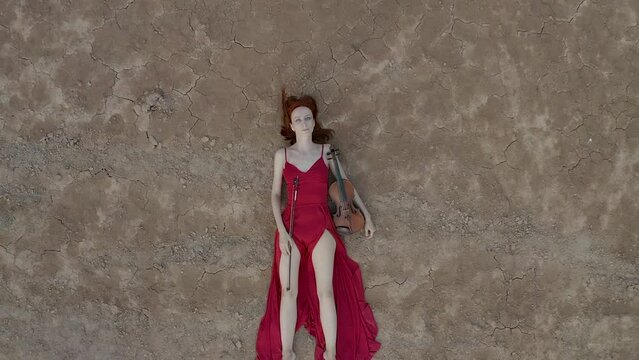 drone's camera rotates and fly at violinist girl lying on the ground to the bottom of the valley of the copper mining quarry