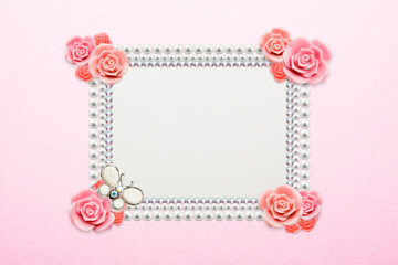 Fototapeta na wymiar pink rose and rhinestone frame
