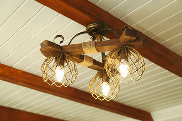 Fixtures on the ceiling of cozy wooden house