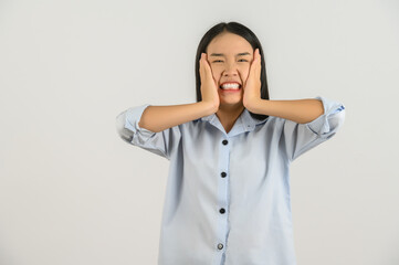 Portrait of Attractive shocked young asian woman in blue shirt isolated on white background