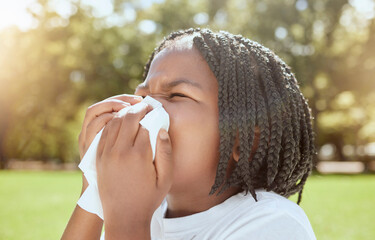 Covid, health and black kid blowing nose at park, nature or outdoors. Wellness, healthcare and sick girl child with tissue to wipe nose for virus, infection or cold, flu or covid 19, fever or allergy