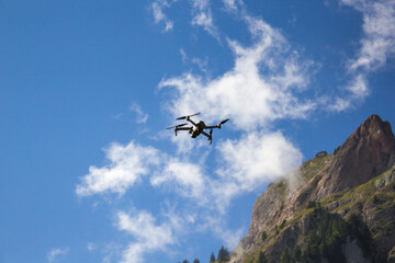 Fototapeta na wymiar Drone flying high in the Mountains of Europe