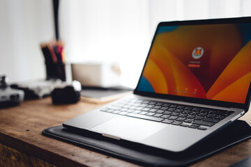 Close up of businessman working and login on laptop