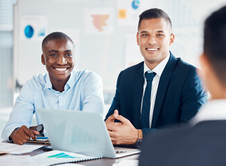 Meeting, laptop and finance with a business man and team in discussion together in an office...