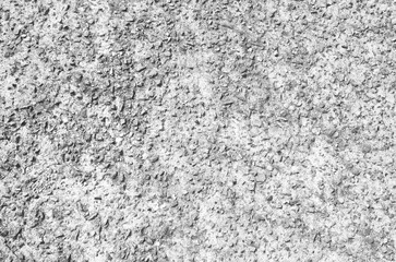 White washed out earthen floor texture background. Pebble-filled road surface.