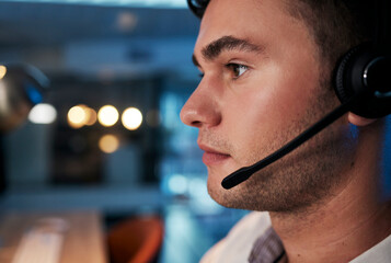 Call center, night and face of man with microphone for consulting for customer service,...