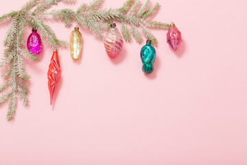 vintage glass christmas toys on pink background
