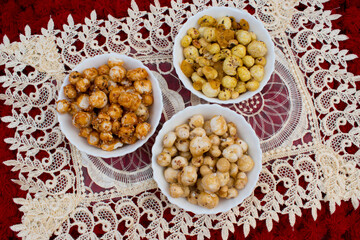Crispy, healthy and homamade Phool Makhana or Fox Nuts snacks platter. It contain caramel makhana with jaggery, with sugar and Makhana mixture having peanut and cornflakes.