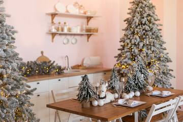 Christmas and New Year decorate the interior of the kitchen