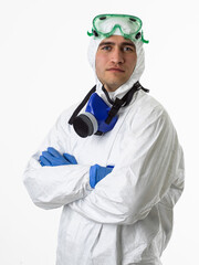 Doctor wearing protective biological suit and mask due to coronavirus 2019-nCoV global pandemic warning and danger background against white background.