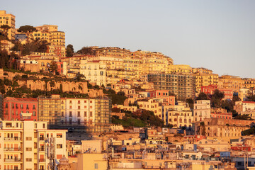 Fototapeta premium Residential Apartment Home Buildings in Historic Downtown City on Mediterranean Coast of Naples, Italy. Sunrise Sky.