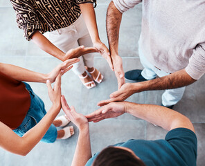 Teamwork, hands and circle of business people for support, power and trust for collaboration, synergy and team building motivation in office. Group, community or team for growth, mission and vision