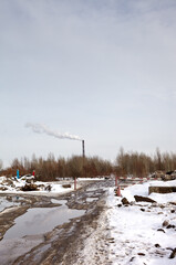 Nature landscape against the background of power plant in Kyiv, Ukraine. View of pipe with smoke after burning coal. concept of ecology problems