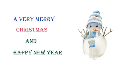 Snowman isolated on white background, copy space. Closeup of snowman wearing hat and scarf, christmas and new year celebration