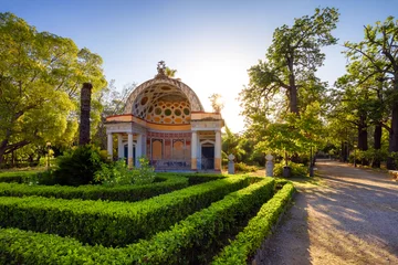 Foto auf Acrylglas Path with vibrant green trees in city park, Villa Giulia. Palermo, Sicily, Italy. © edb3_16