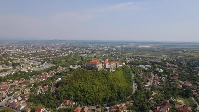 aerial view of palanok castle in Ukraine travel landmark, blue sky