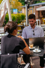 Confused businessman and businesswoman cannot solve the problem about the project