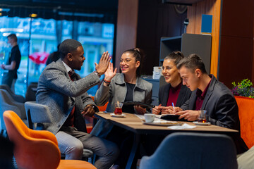 Having a conversation about the business while smiling together