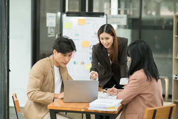 Fototapeta premium Asian business working together to discuss new projects.