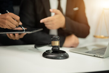 Lawyers having  Concepts of  Legal services at the law office work Legal advice online on computer labor law