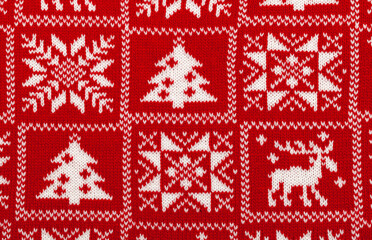 Red knitted fabric with white traditional cristmas geometric ornament
