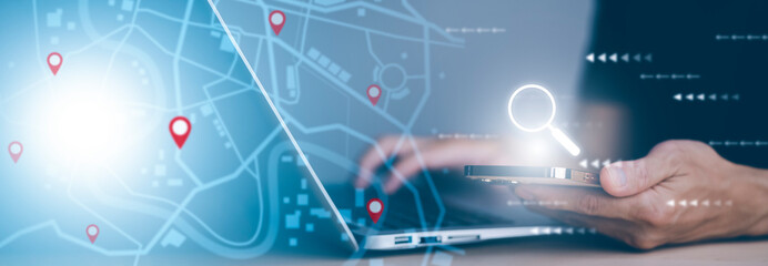 Businessman hand holding virtual world and model map with location point , GPS app, icon Travel maps and find places in the online system, all screen graphics are generated,Searching for travel goals.