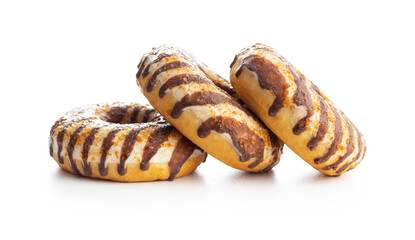 Donuts with chocolate and caramel icing isolated on white background.