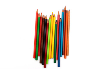 Used wooden colored pencils isolated on white background