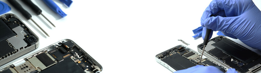 Technician repairing the Cell phone parts and tools for recovery repair phone smartphone and...
