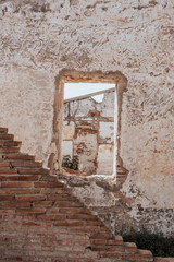 A window in an old ruined house