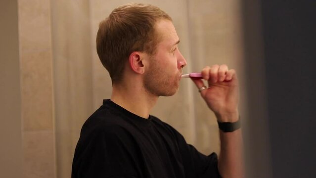 Young man in the bathroom 
