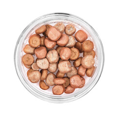 Mixed bronzing face powder balls in glass box, bronzing pearls jar isolated on white background