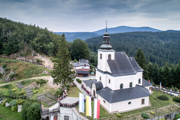 Maria Sniezna Sanctuary, Igliczna mountain, Poland aerial shot on a cloudy day.