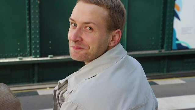 Portrait of a young man looking into the camera 