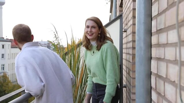 Two friends on the balcony