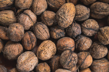 whole walnuts closeup grunge background