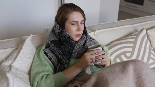 Woman sick on the couch