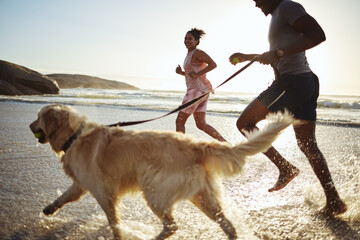 Exercise, running and couple with their dog on the beach for a cardio workout for sport training....