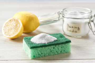 house care natural healthy cleaning with baking soda on a white wooden table.