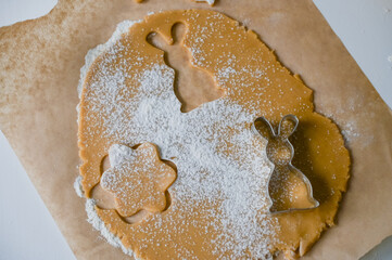 Making Christmas gingerbread cookies from dough