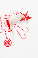 red and white christmas decorations on white  background
