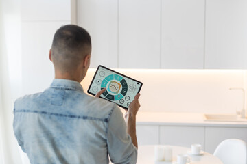 Smart remote home control system app. Living room interior in background.