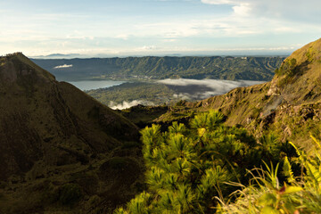 Breathtaking sunrise over Abang mountain, view from Batur volcano and Batur lake, Bali, Indonesia