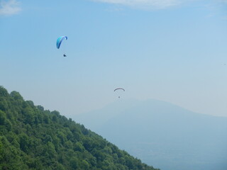 Fototapeta na wymiar Para Glider Lago Maggiore Lake Blue Sky Italy alps european