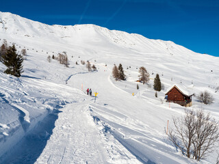 Slope view with funicular in winter in resort Ladis, Fiss, Serfaus in ski resort in Tyrol.