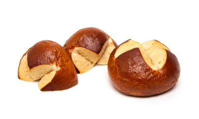 Freshly baked traditional German laugenbrot. Bavarian homemade pretzel rolls lye bread, close-up, isolated on white background