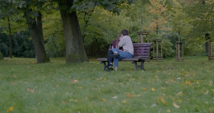 Watching a couple in love from a distance. The emotion of jealousy abandoned ex-boyfriend. Spy on someone secretly.